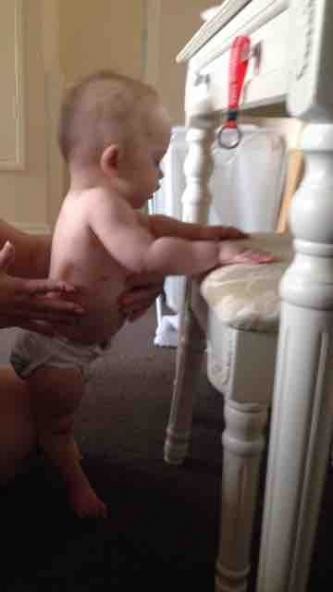 baby not standing at 14 months