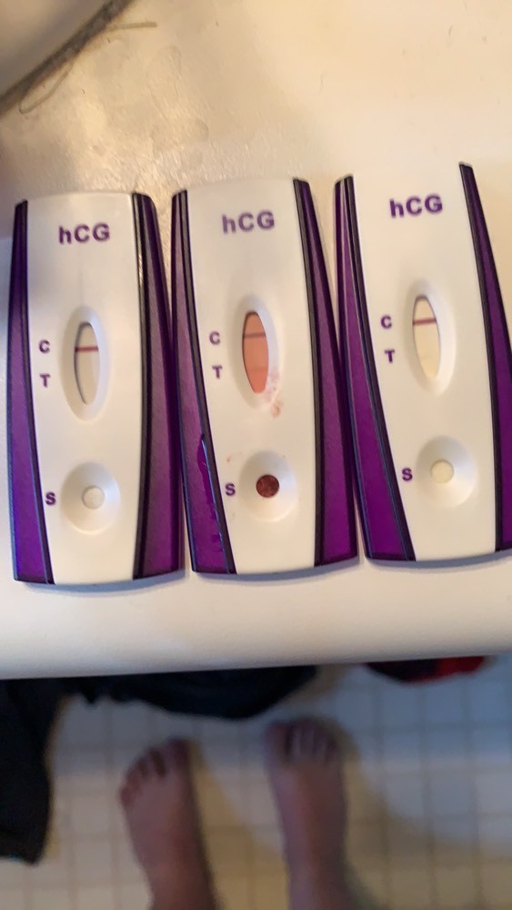 late period negative pregnancy test white discharge